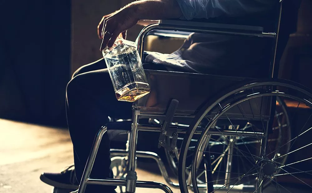 alcoholic man sitting in a wheelchair 2022 09 16 09 01 19 utc